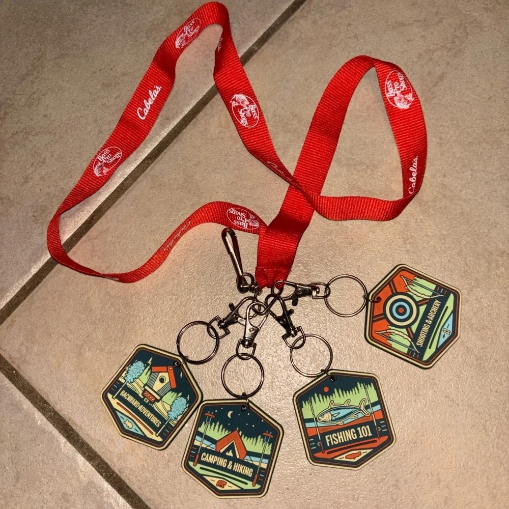 Cabela's Red Lanyard with Boy scout like badges